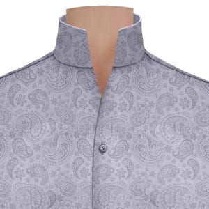 May include: A grey paisley patterned dress shirt with a mandarin collar.
