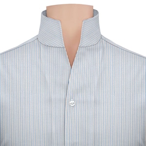 May include: Close-up of a striped shirt with a band collar. The shirt has vertical stripes in light blue and brown against a white background. A single white button is visible at the collar's opening.