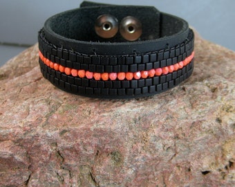 Unisex black and orange leather beaded bracelet, leather cuff bracelet, Swarovski beaded bracelet, statement bracelet, peyote stitched