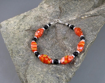 Ladies beaded bracelet, Orange and black bracelet, women’s fashion, contemporary style jewelry