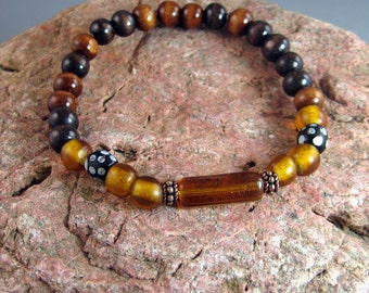 Brown beaded stretch bracelet, mens beaded bracelet, wound glass trade beads, rustic jewelry, tribal jewelry, earth tone colors, southwest