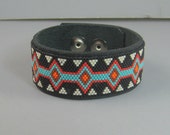 Native American beaded bracelet, leather cuff bracelet, peyote stitched bracelet, black red blue bracelet, seed bead bracelet, tribal