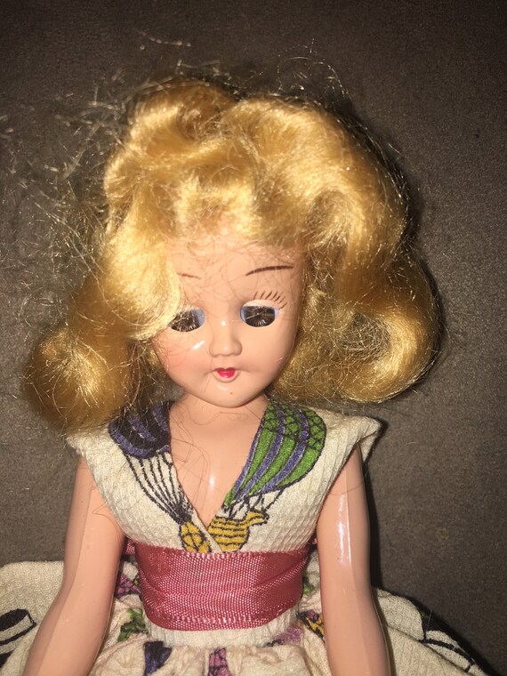 creepy blonde doll