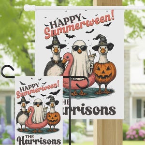 May include: A white garden flag featuring the text Happy Summerween! and The Harrisons. The illustration shows three ducks: one in a witch hat and cape, one as a ghost with sunglasses in a pink flamingo floatie, and one in a witch hat inside a pumpkin.