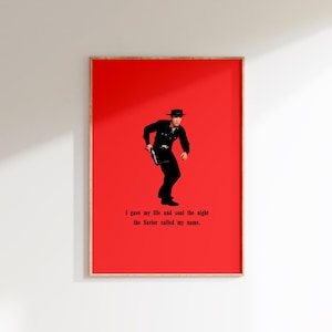 May include: A red poster with a black and white silhouette of a man wearing a hat and holding a gun. The text on the poster reads "I gave my life and soul the night the Savior called my name."
