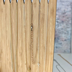 back side of necklace stand