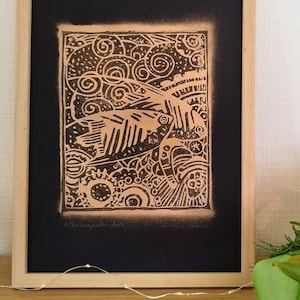 Composition dorée, linogravure, encre et dorure faite à la main par l'artiste. Oeuvre unique, tirage numéroté, série limitée et signée