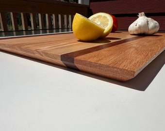 Charcuterie/ cutting board, made from hardwood.  all boards are just under 16" x 12" about 1 inch thick. Boards can be personalized