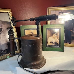 Re-purposed vintage torch light. Antique, original patina great for use in the den, man cave a gift for dad.  Upcycled brass, metal lamp.