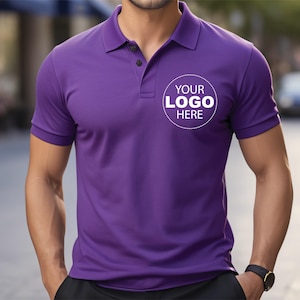 A man wearing a purple polo shirt with the text "YOUR LOGO HERE" printed on it.
