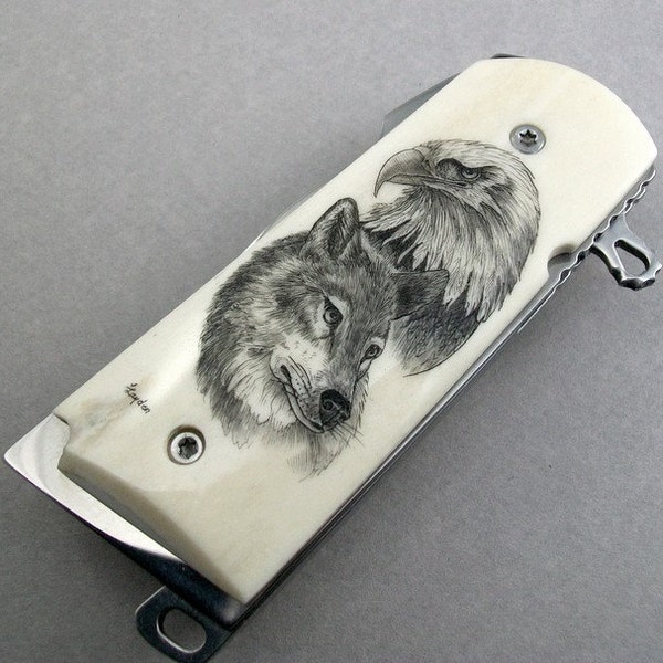Scrimshaw Assisted Opening Knife with Eagle Head and Wolf Portraits