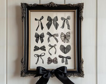 May include: A framed print featuring watercolor illustrations of various black bows. The artwork is displayed in a black ornate frame with a gold inner border. A large black satin bow is attached to the bottom of the frame.
