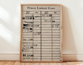 May include: A framed vintage public library card print. The card features the text "PUBLIC LIBRARY CARD" at the top, with columns for "DATE DUE" and "RET." Dates like "SEP 2 1981" and "OCT 18 1989" are stamped on the card. The frame is made of light brown wood.