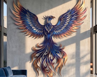 May include: A large metal wall sculpture of a phoenix with wings spread wide. The artwork features a gradient color scheme transitioning from deep blue at the center to vibrant orange and copper tones along the edges of the feathers and tail.