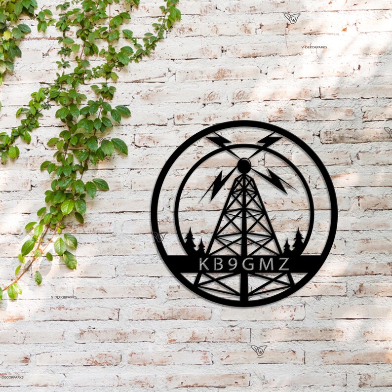 May include: Black metal sign with a radio tower design and the call sign "KB9GMZ" in a circle.