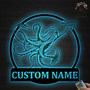 May include: A black and white illustration of a squid with tentacles, inside a black circle with a blue glow. The text "CUSTOM NAME" is below the circle.