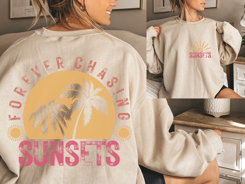 May include: A beige sweatshirt with a graphic print of a sunset and palm trees. The text "FOREVER CHASING SUNSETS" is printed on the back of the sweatshirt.