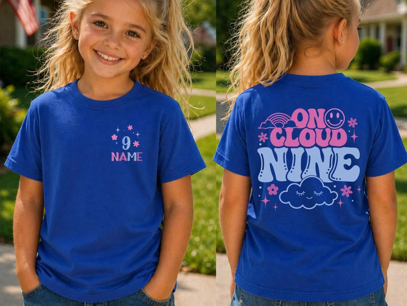 May include: Royal blue t-shirt with a front graphic featuring the number 9, stars, and the word "NAME" in pink and blue. The back of the shirt displays the phrase "ON CLOUD NINE" with a rainbow, smiley face, cloud, and stars.