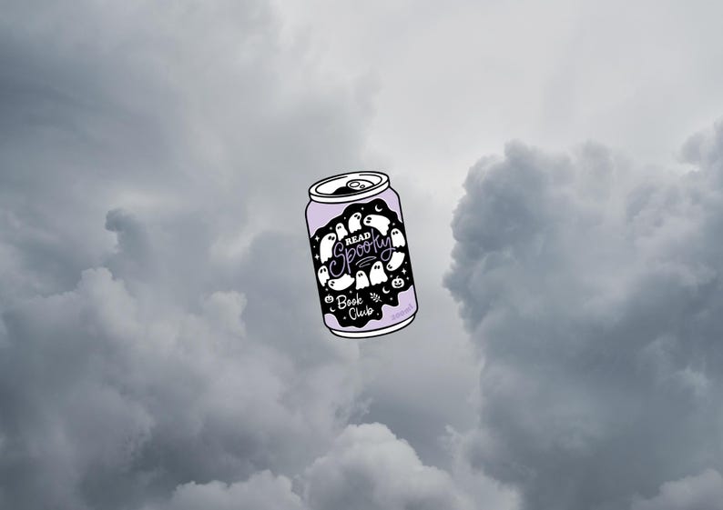 May include: A light purple can with a black label featuring white ghost illustrations and the text "Read Spooky Book Club". The can is set against a cloudy, gray sky.