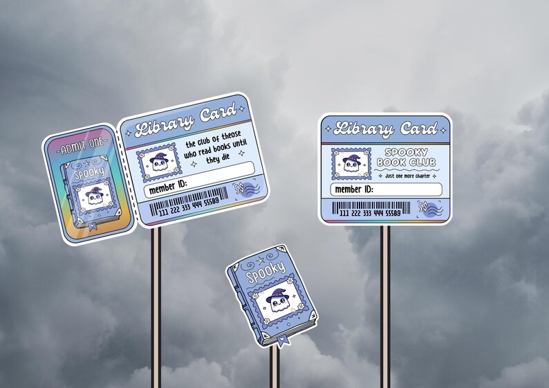 May include: A collection of light blue library cards and a book-shaped sticker with a spooky theme. The cards feature a ghost wearing a witch hat, the text "Spooky Book Club", and the phrase "the club of those who read books until they die".
