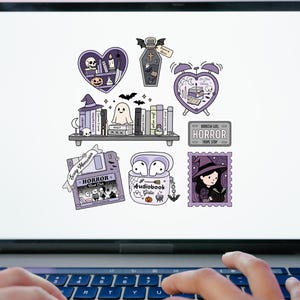 May include: A selection of purple and white Halloween-themed stickers on a laptop screen. The stickers feature a heart with a skull, a coffin, a bookshelf with a ghost, an alarm clock, a license plate, a floppy disk, earbuds, and a witch.