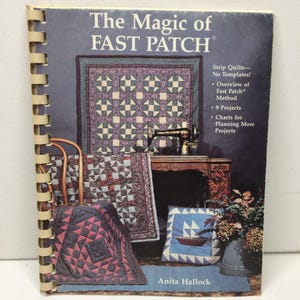 May include: A spiral-bound book titled "The Magic of FAST PATCH" featuring a quilt design on the cover. The book includes information on strip quilts, the Fast Patch method, projects, and planning charts. The cover also displays a sewing machine and various quilt examples.