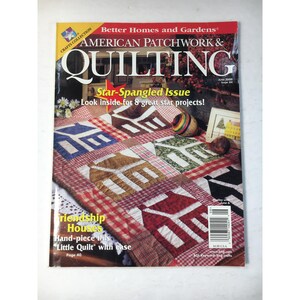 May include: The cover of "American Patchwork & Quilting" magazine, June 2000 issue, features a quilt with house patterns in red, brown, and blue. The magazine's title is in large white letters, with the words "Star-Spangled Issue" and "Friendship Houses" visible.