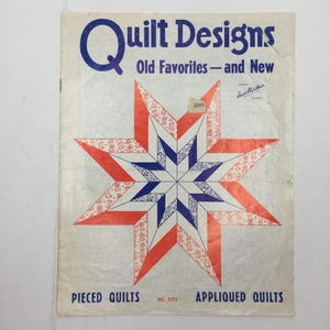 May include: Vintage quilt design booklet with a star pattern in red, white, and blue. The cover reads "Quilt Designs" and "Old Favorites - and New." The booklet also says "Pieced Quilts" and "Appliqued Quilts."