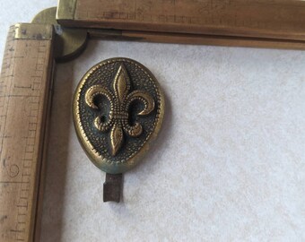 fleur de lis wall hanging hook brass vintage unique