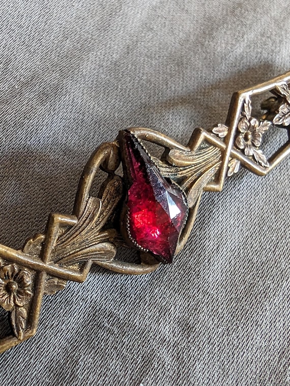Antique Victorian brooch with rose cut glass ruby