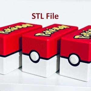 May include: Three red and white rectangular boxes with a button detail, featuring the word "Pokémon" in yellow. The text "STL File" is above the boxes. These boxes are likely for storage or display.
