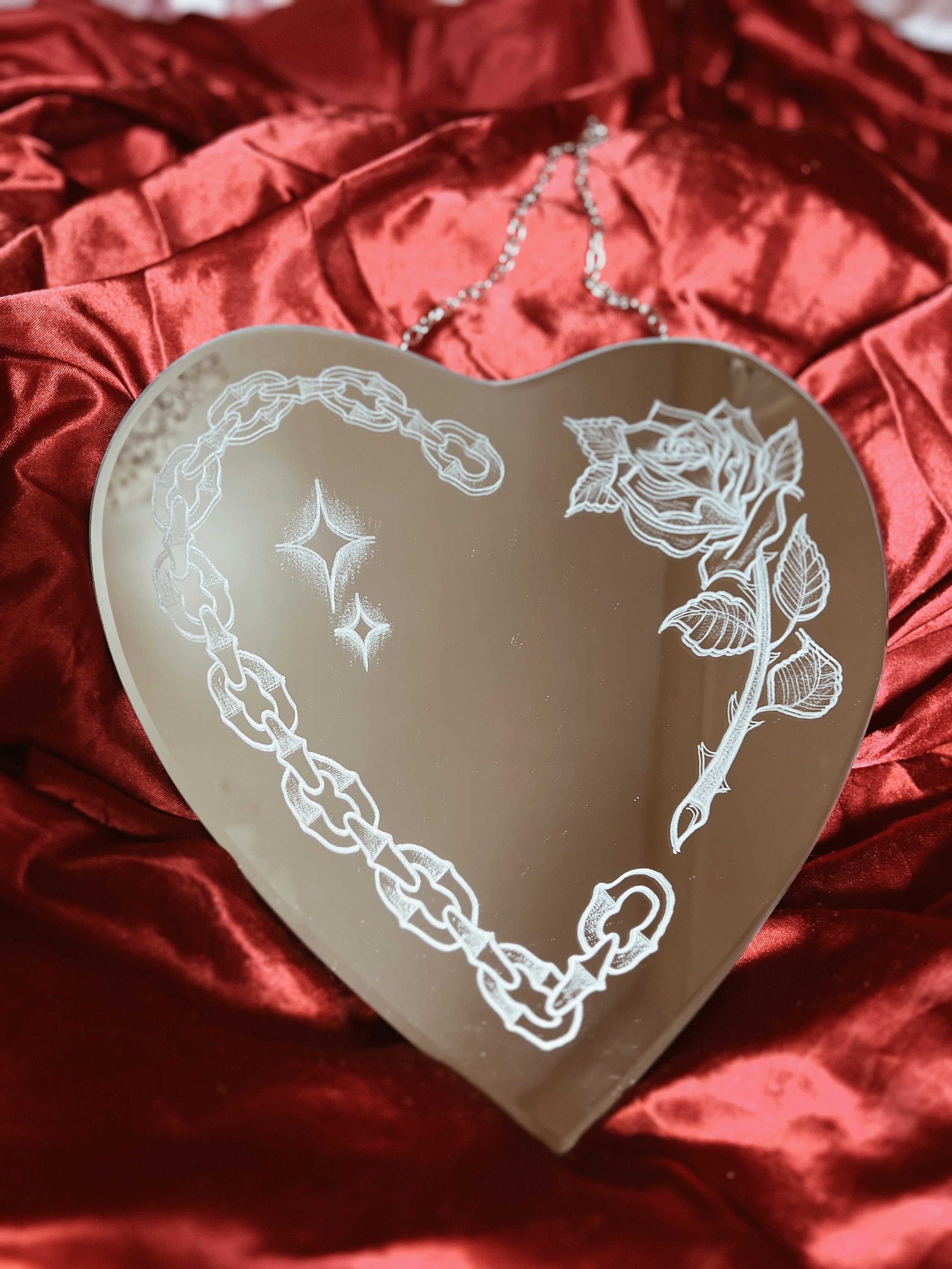 Chain and rose in a heart shaped handmade hand engraved American traditional tattoo style wall decor mirror