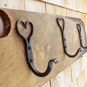 Hand forged heart shaped coat hooks on a wide pine board FREE SHIPPING image 1