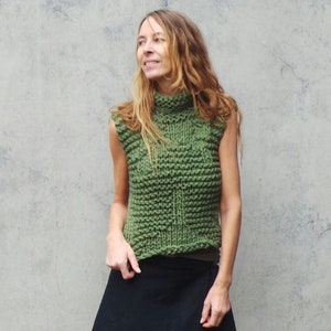 green chunky vest, tank top, with high neck. image 1