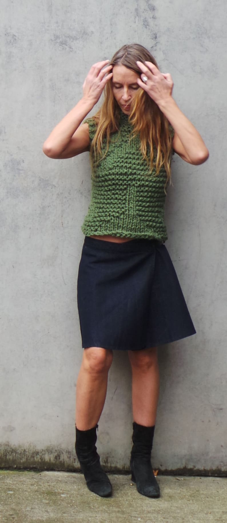 green chunky vest, tank top, with high neck. image 3