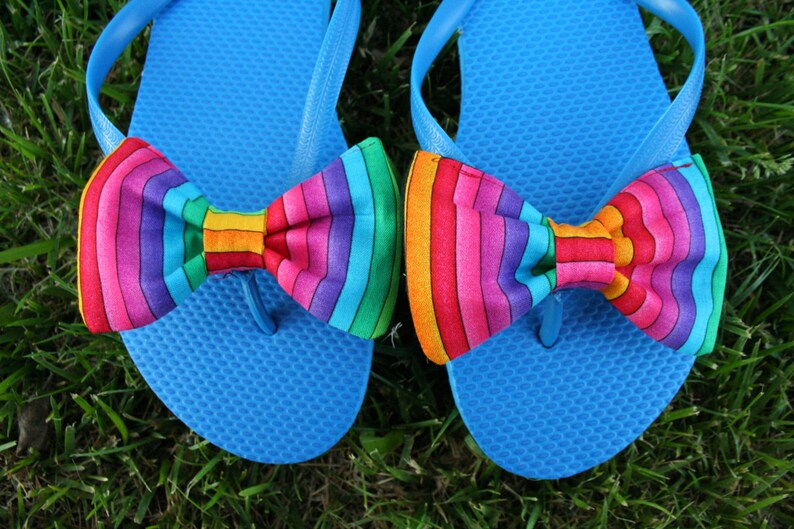 red rainbow flip flops