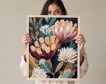 May include: A framed floral art print featuring a vibrant botanical design. The artwork showcases large, stylized flowers in shades of peach, burgundy, and cream against a dark teal background. The wooden frame adds a natural touch to the piece.