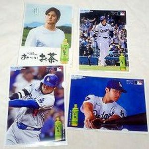 May include: Four promotional images featuring a baseball player in a Dodgers uniform. Each image includes a bottle of green tea. The images show the player in various action shots, including batting and posing.