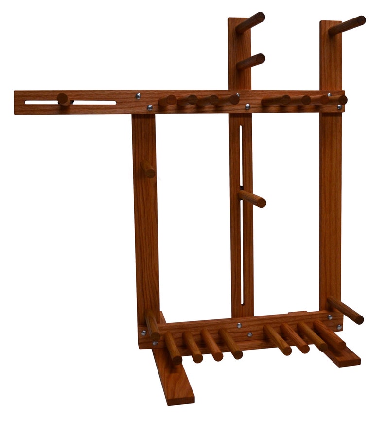 Large handcrafted floor standing inkle loom with 6.5 inch long pegs. Handmade in the USA from solid red oak hardwood. Great for card and tablet weaving, belts, straps and much more!