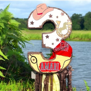 Cowboy pinata horse and rodeo pinata pinata with numbers from 1 to 9 personalized pinatas for celebrations at the farm cowboy party
