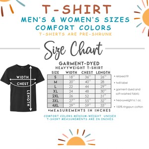 May include: A black t-shirt with a size chart for garment-dyed, heavyweight t-shirts. The chart includes measurements in inches for width, chest, and length, ranging from size small to 4XL. The shirt is made of 100% ringspun cotton.