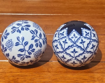 Porcelain Decorative Balls Set of 2 Blue White Spheres Floral Geometric Patterns