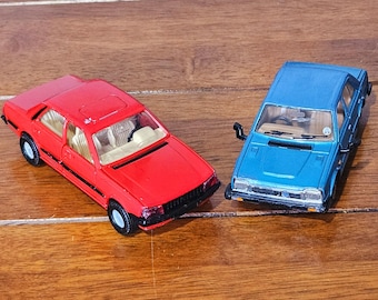 Corgi Triumph Acclaim Blue 1:36th 276 and Corgi Peugeot 505 ST1