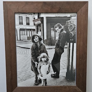 Framed Print Robert Doisneau &quot;The children of Place Hérbert, Paris, 1957