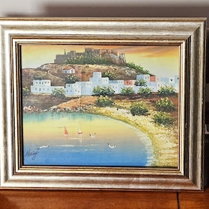 Vintage Signed And Framed Oil On Canvas Of Spanish Landscape with A Village By The Sea