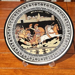 May include: A handmade wooden sign with the text "Welcome to our home" in a handwritten style. The sign is painted white with black lettering and a distressed finish, perfect for home decor.