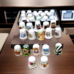 Collection of 33 Bone China Porcelain Thimbles  Various  Makers
