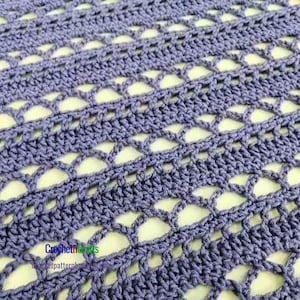 May include: A lavender crochet fabric featuring a repeating pattern of solid horizontal rows alternating with rows of openwork arches. The text CrochetCrafts pattern appears in the lower left corner in blue and green lettering.