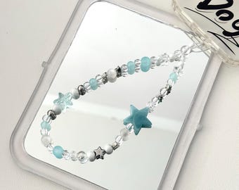 Ciondolo per cellulare fatto a mano con perline blu, cinturino da polso minimalista a forma di stella.