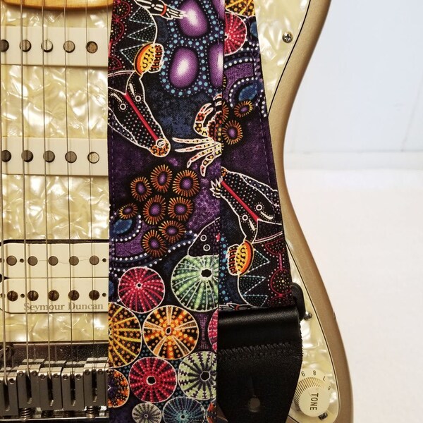 black and purple down under aboriginal sea life crocodile and sea horse guitar strap